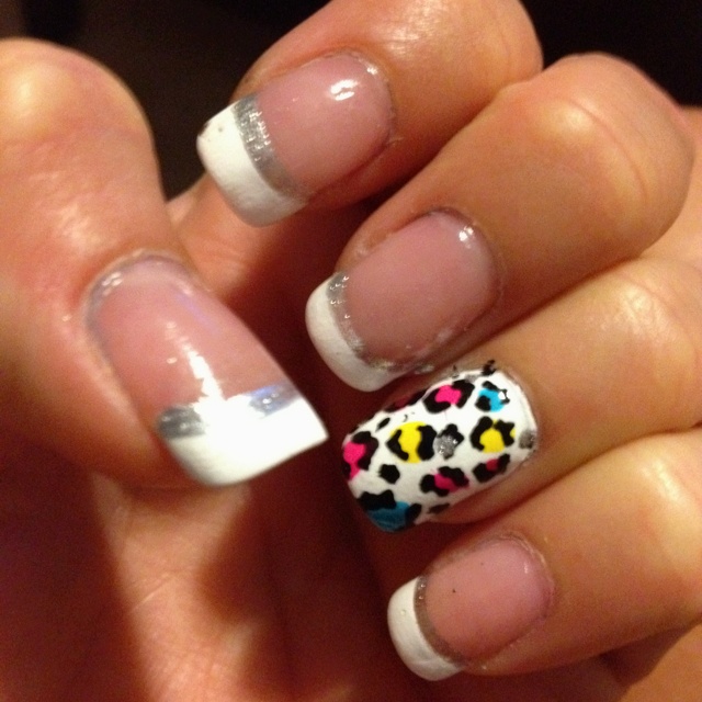 Vibrant French Tip Nail Design with Playful Animal Print Accents.