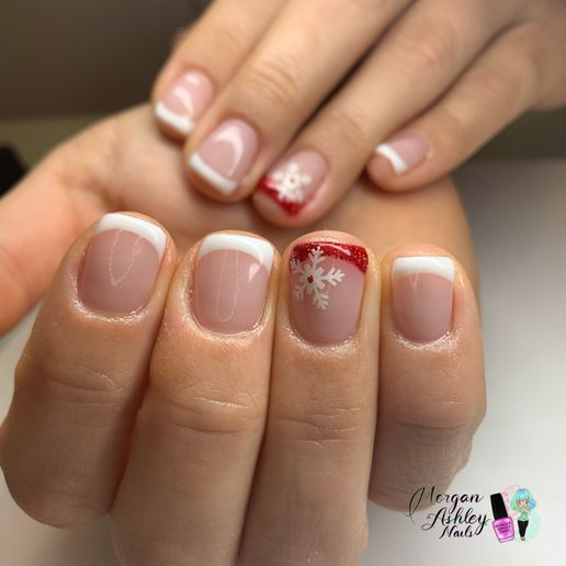 Charming Holiday Nail Design: Classic French with Festive Red Snowflake Accent