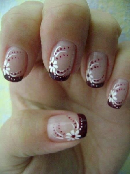 Sophisticated Floral Nail Design with Burgundy Gradient Tips and Delicate Accents