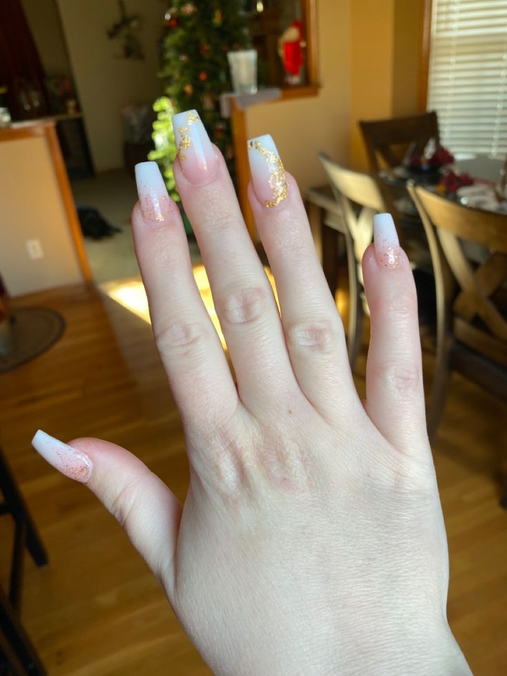 Elegant Gradient Manicure: Long Square Nails with White-Peach Transition and Gold Accents.