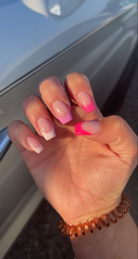 Chic Nail Design: Pastel Pink and Bold Magenta with Playful French Tips.