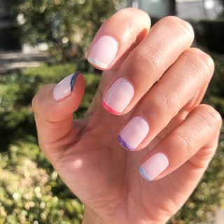 Minimalist Chic Nail Design with Pastel Accents and Soft Pink Base.