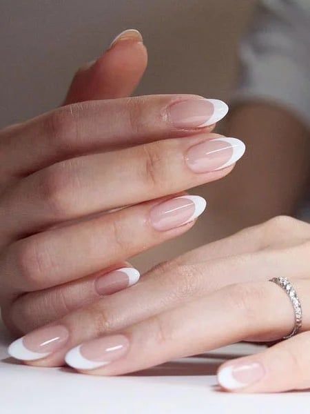 Timeless French Manicure with Modern Accents for Elegant Nail Design