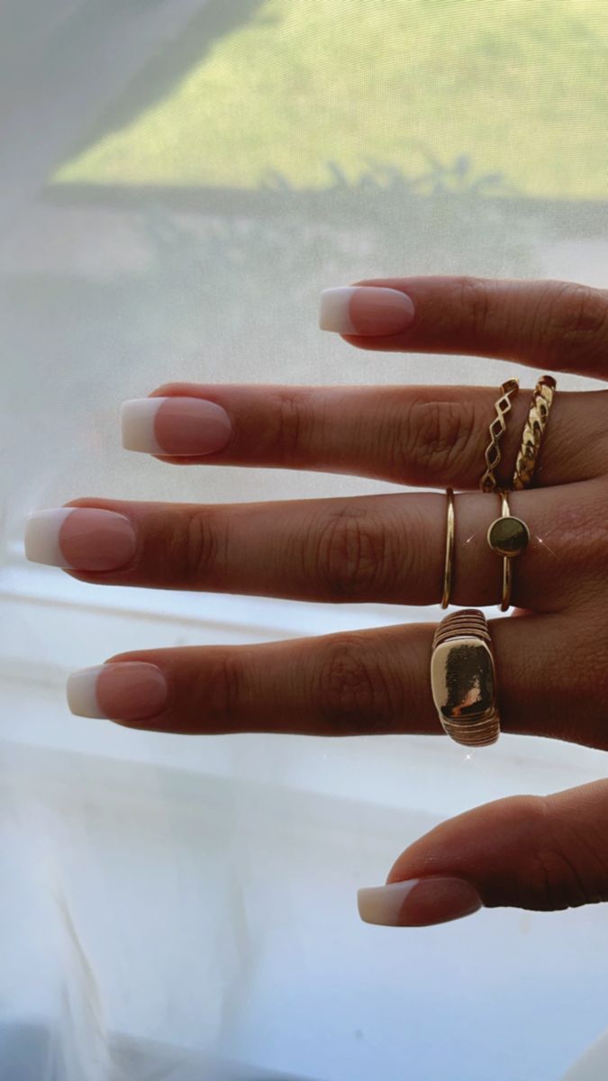 Sophisticated Elegance: Timeless French Tip Nails with Gold Accents