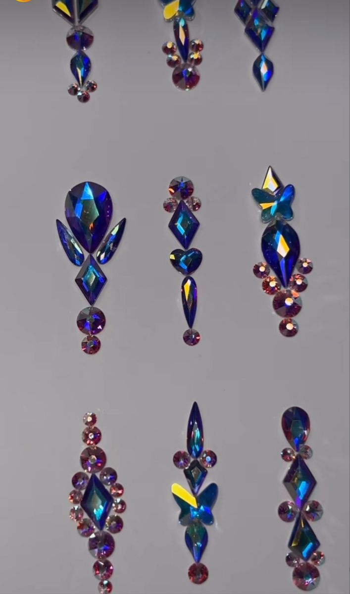 Vibrant Multi-Faceted Blue and Purple Rhinestone Nail Embellishments for Stunning Manicures.