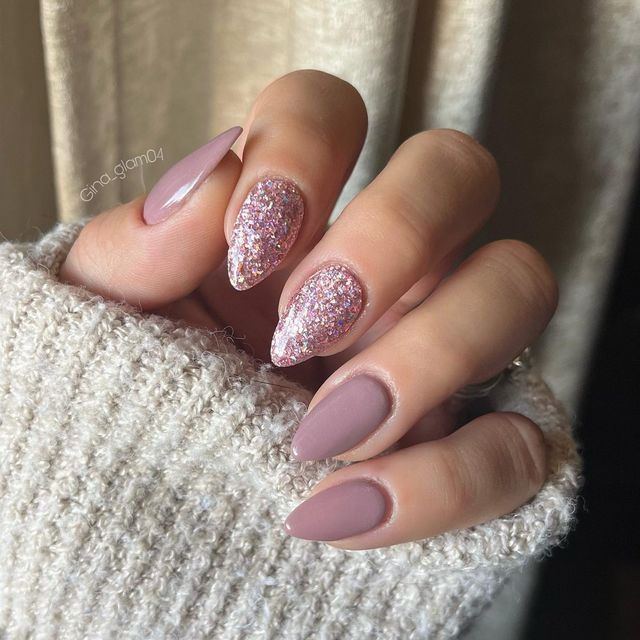 Chic Almond-Shaped Nail Design: Matte Mauve with Glitter Accents