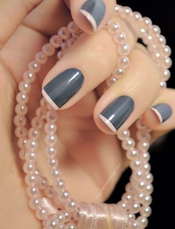 Sophisticated Gray Nail Design with Delicate White Tips and Pearl Accents.