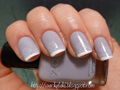 Elegant Lavender Nail Design with Matte Finish and Chic White Tips.