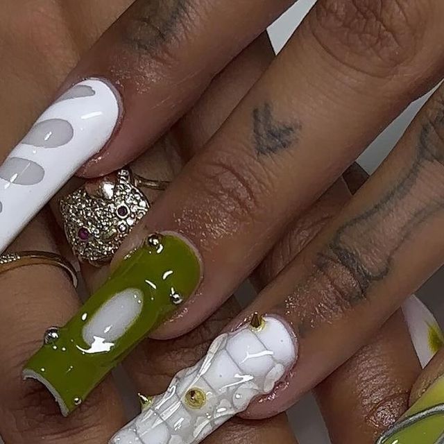 Contemporary Vibrant Nail Design with Glossy Green and White Textures.