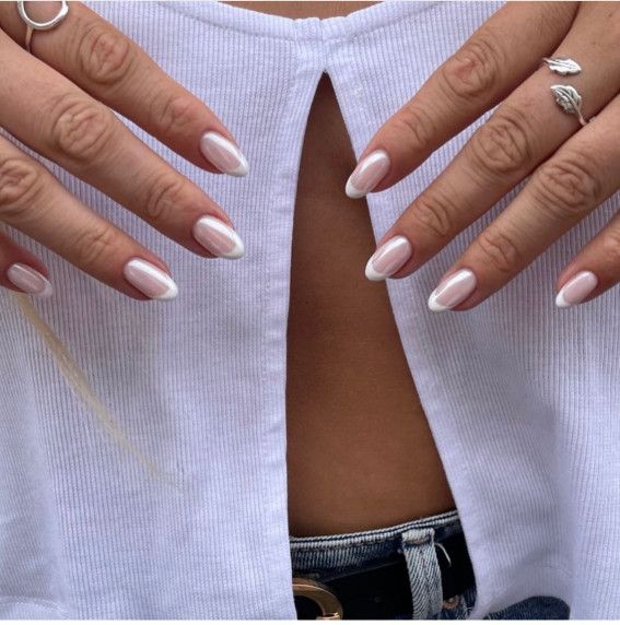 Chic Almond-Shaped Nails: Soft Pink Base with Elegant White Tips