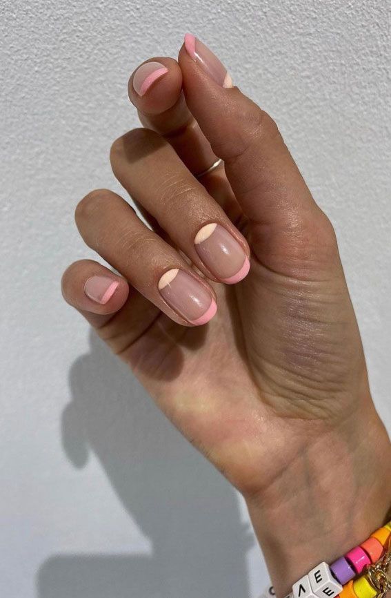 Chic Pink and Peach French Tip Nail Design with Half-Moon Detail for a Modern Aesthetic