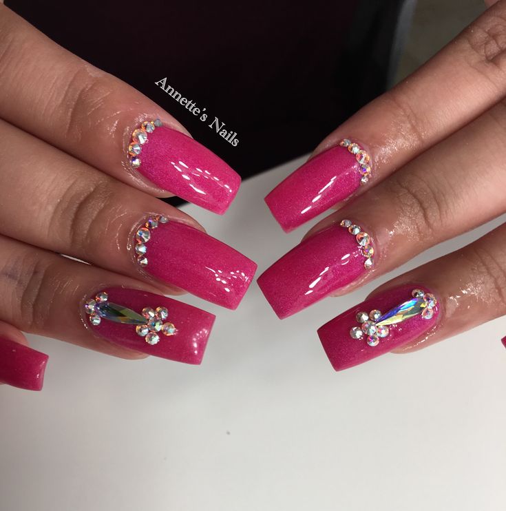 Glamorous Vibrant Pink Square Nails Adorned with Sparkling Rhinestones.