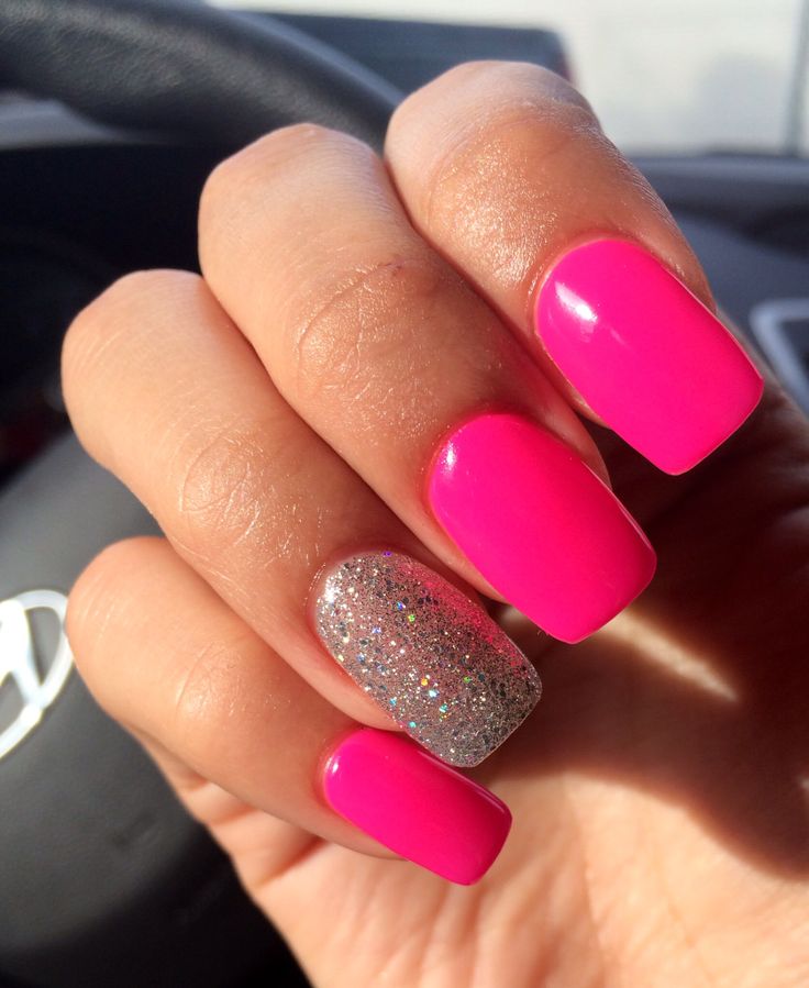 Bold Pink Nails with Glittering Silver Accent for a Glamorous Look.