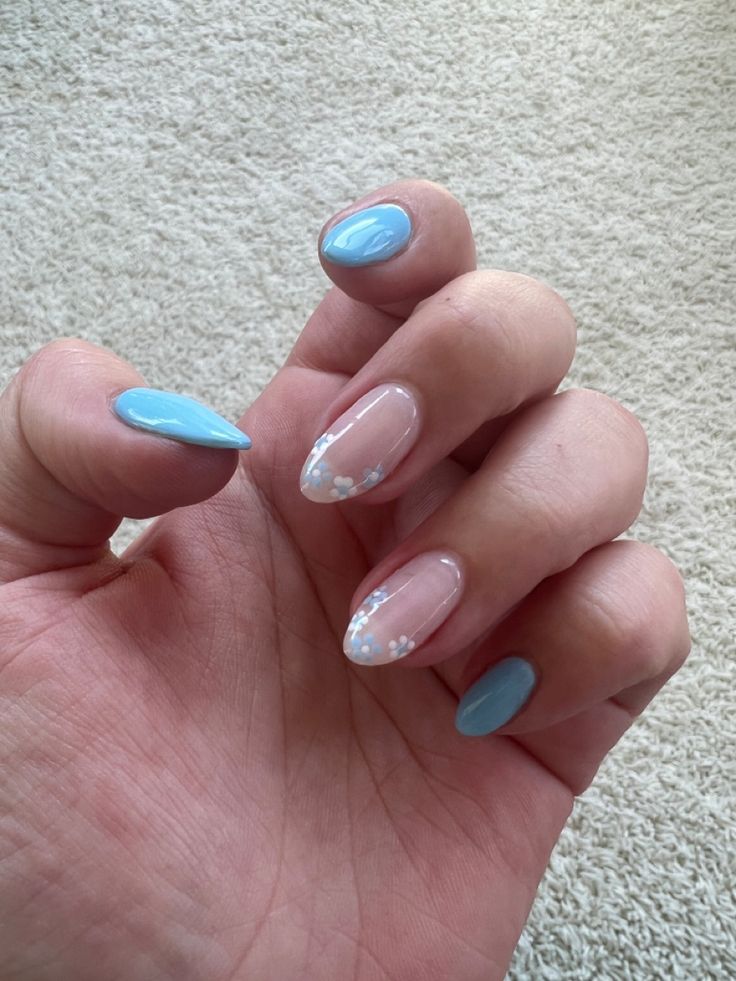 Charming Blue and Pink Floral Nail Design: A Playful Elegance.