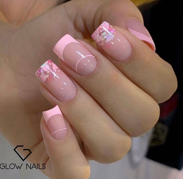 Sophisticated Pink Nail Design Blending Classic Shapes with Modern Floral Accents.