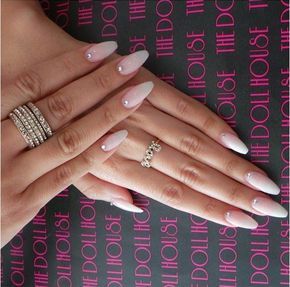 Chic Almond-Shaped Ombre Nails with Rhinestones and Stylish Rings.