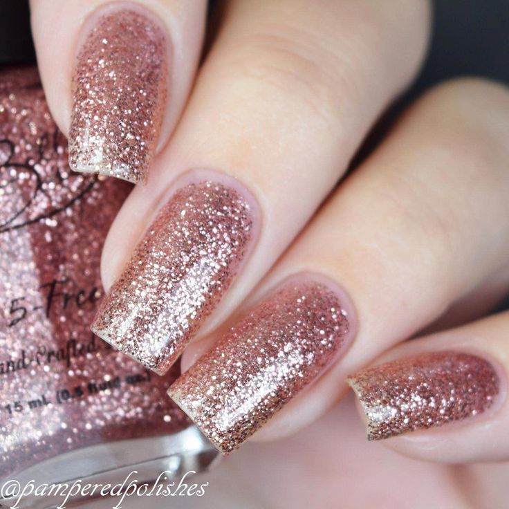 Stunning Glittery Rose Gold Nails: A Glamorous Choice for Any Occasion.