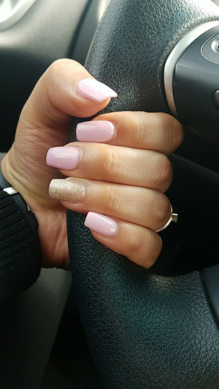 Chic Elegance: Soft Pink Nail Design with Glamorous Gold Accent