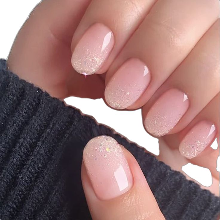 Elegant Soft Pink Ombre Nail Design with Glitter Tips