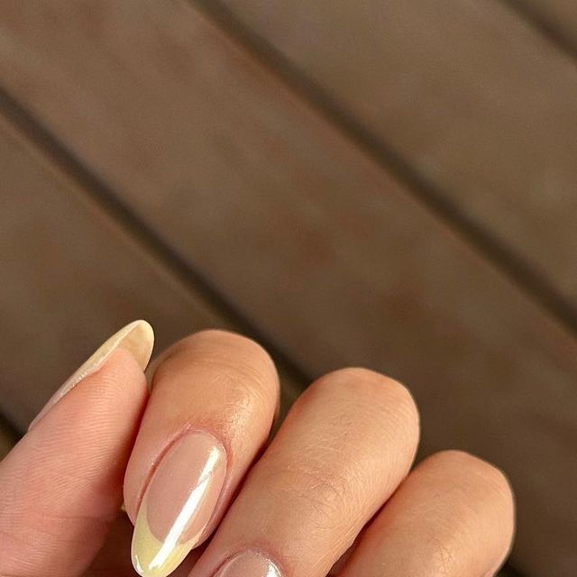 Chic Almond-Shaped Nude Nails with Subtle Yellow Tips for Any Occasion