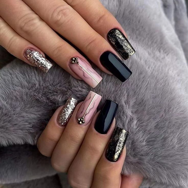 Chic and Striking Multitexture Nail Design with Glossy Black, Shimmering Gold, and Soft Pink Accents.