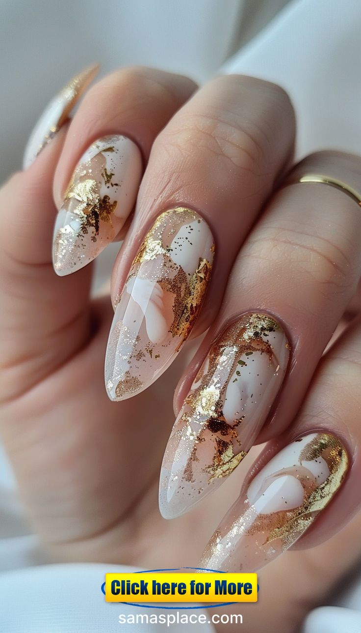 Elegant Nude and White Nail Design with Gold Accents for Any Occasion.