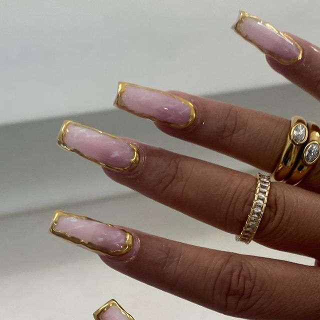 Sophisticated Elegant Pink and Gold Edge Nail Design with Glossy Finish