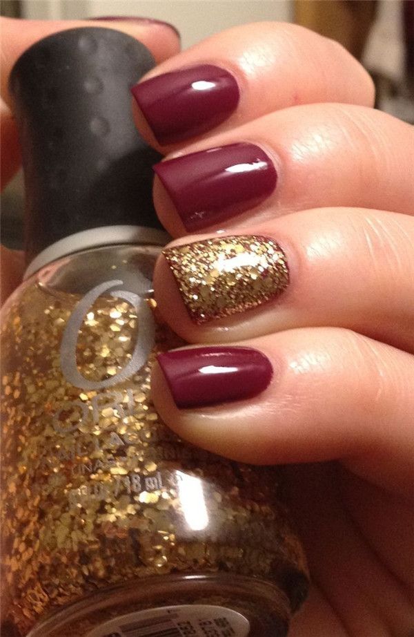 Elegant Deep Burgundy and Gold Glitter Nail Design for Special Occasions.