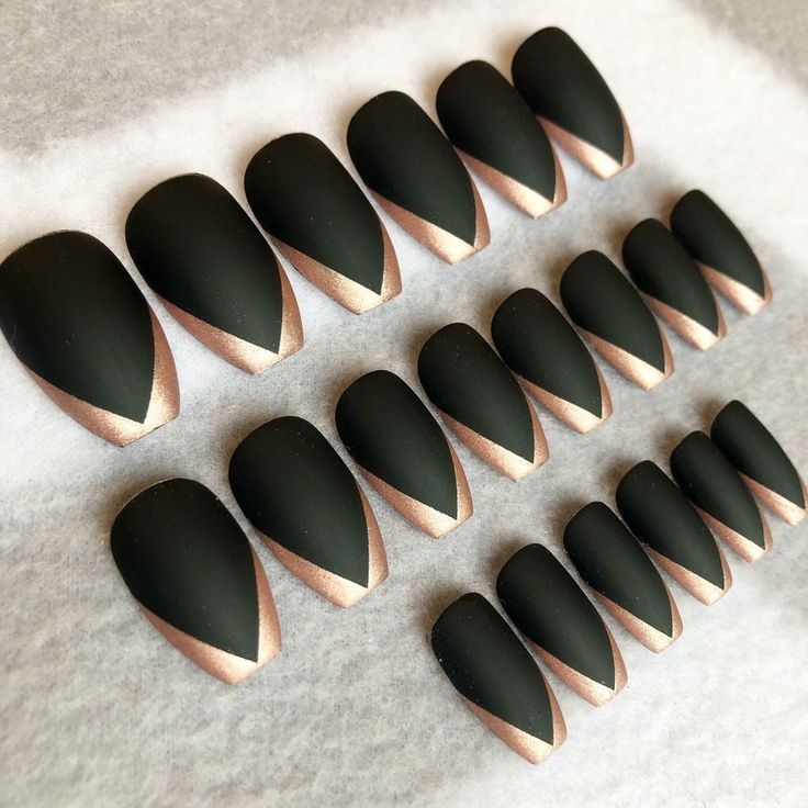 Chic Matte Black Nail Design with Shimmering Rose Gold Outline for Any Occasion