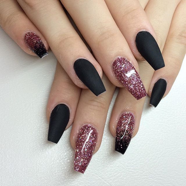 Elegant Ombre Nail Design: Matte Black and Shimmering Burgundy Glitter Combo.