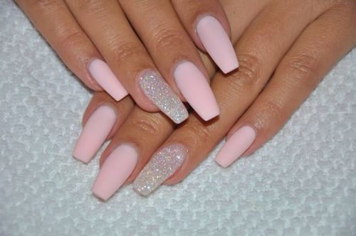 Sophisticated Pastel Pink Matte Manicure with Glamorous Glitter Accent.