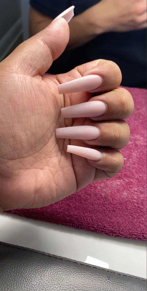 Elegant Almond-Shaped Nails in Soft Pink for Sophisticated Style