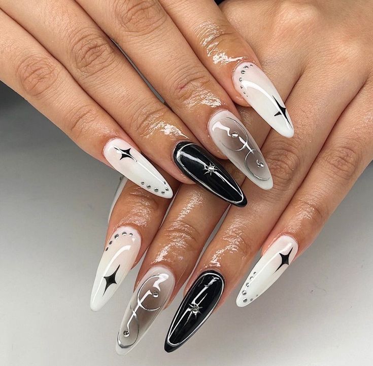 Chic Almond-Shaped Nail Design with Monochrome Geometry and Textured Finishes