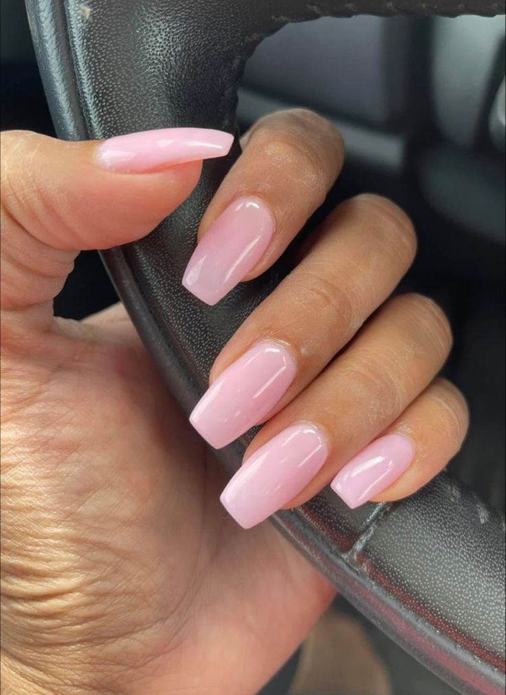 Chic Glossy Pink Nails: Elegant Long Square Design for All Occasions.