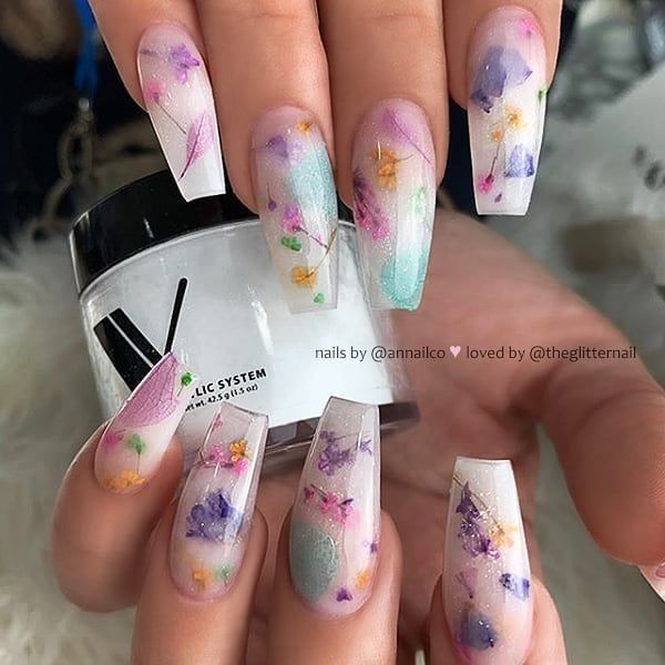 Ethereal Floral Nail Design with Translucent Pastels and Delicate Accents.