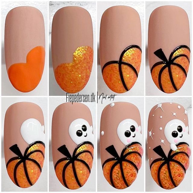 Playful Halloween Nail Art with Glittery Pumpkins and Cute Ghosts.