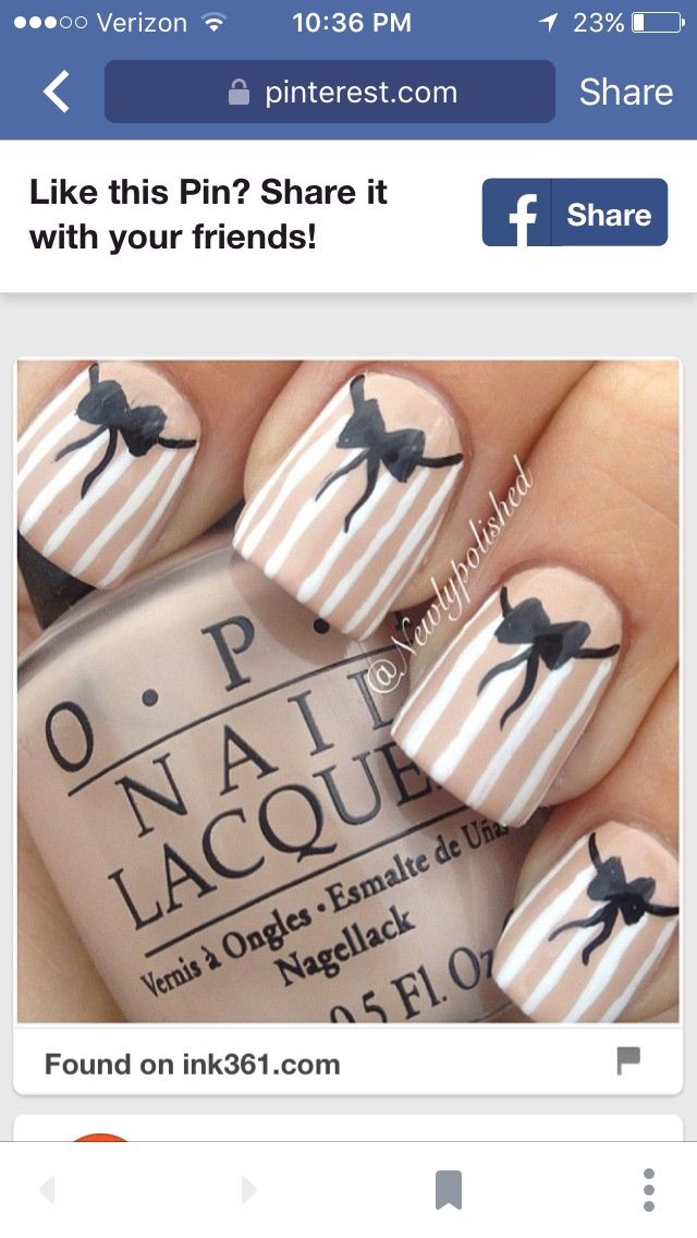 Chic Striped Nail Design with Sophisticated Black Bows