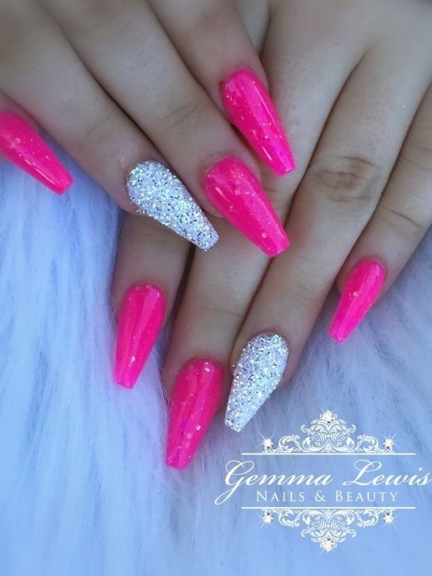 Bold Neon Pink Almond-Shaped Nails with Sparkling Glitter Accent.