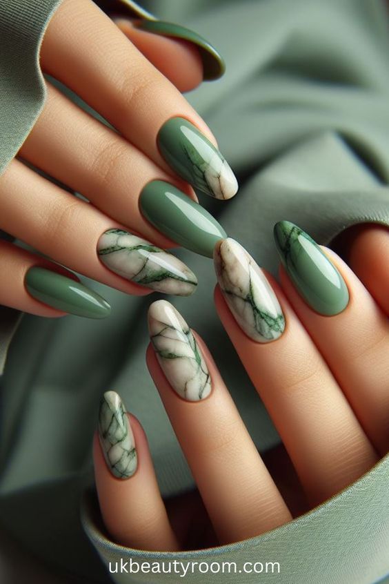 Sophisticated Nail Design: Deep Green and Marble Patterns with a Glossy Finish