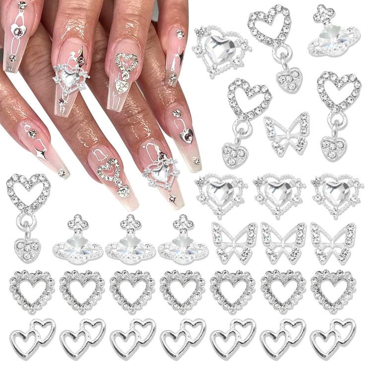 Elegant Rhinestone-Adorned Nail Art with Heart and Butterfly Charms for a Sophisticated Look.