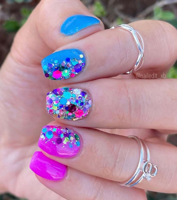 Playful Multicolor Nail Design with Glitter Accent for a Fun, Statement Look.