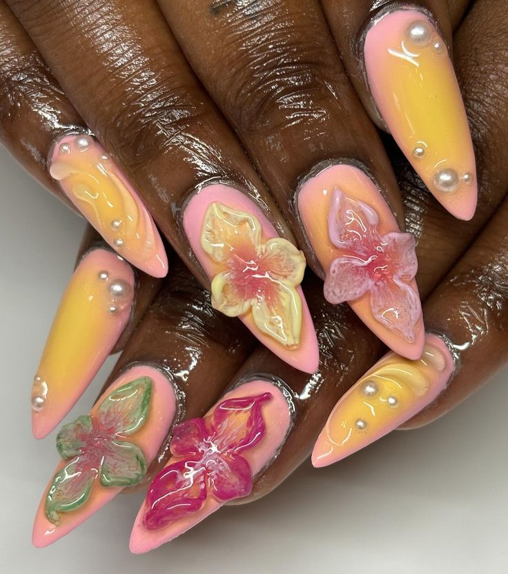 Vibrant Floral Almond-Shaped Nail Design with 3D Flowers and Pearls