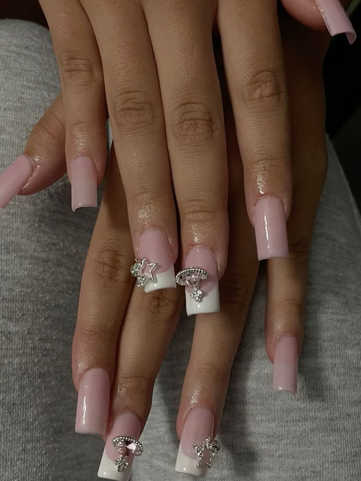 Elegant Soft Pink and White Nail Design with Sparkling Glamour.