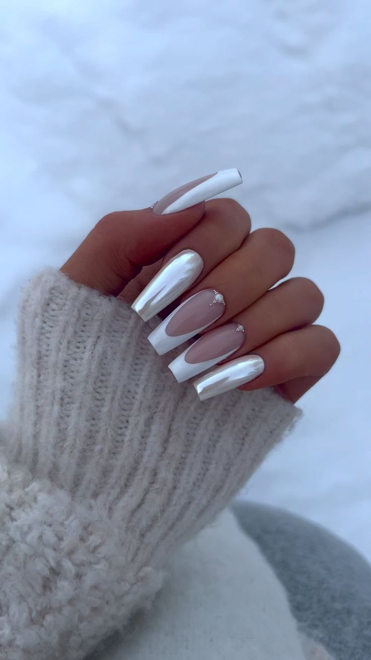 Chic Winter Nail Design: Glossy White Tips with Soft Pink Accents and Shimmering Details