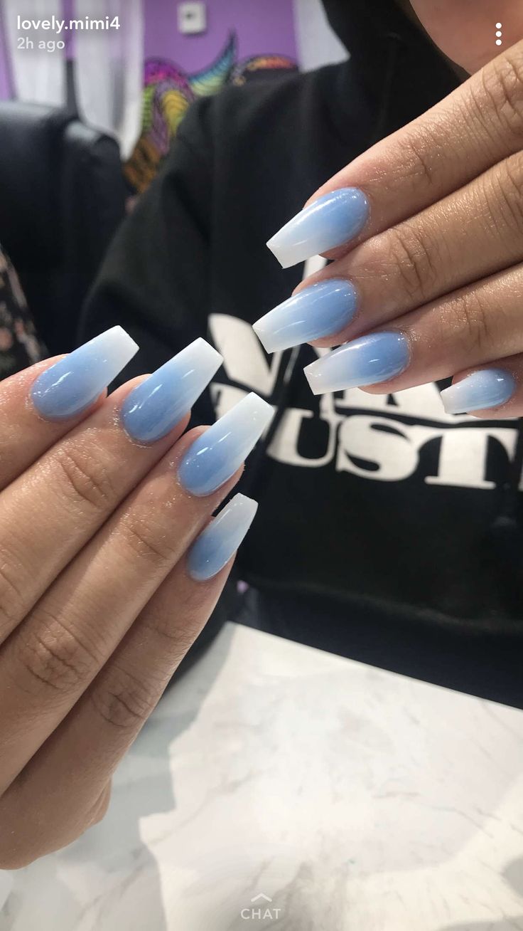 Elegant Ombre Gradient Nail Art: Soft Blue to Crisp White on Long Coffin Nails