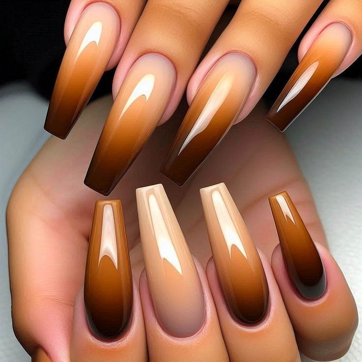 Sophisticated Almond-Shaped Gradient Nail Design in Rich Brown and Nude Shades