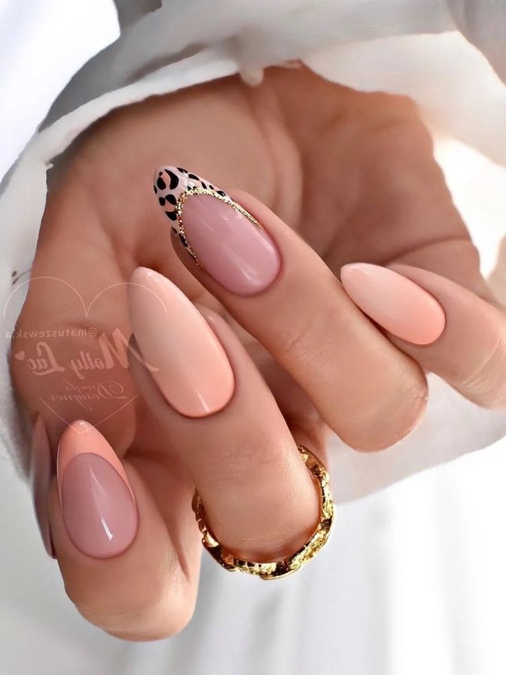 Chic Leopard Print Nail Design with Soft Nude Palette and Gold Accents