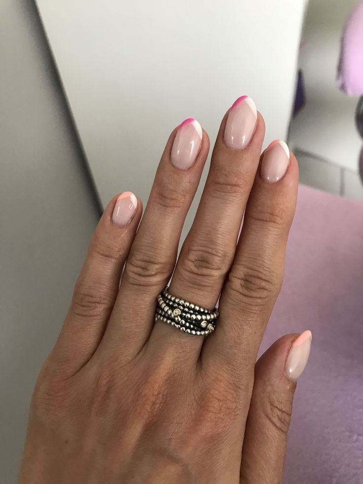 Chic Almond-Shaped Nails with Soft Nude Base and Vibrant Pink Tips