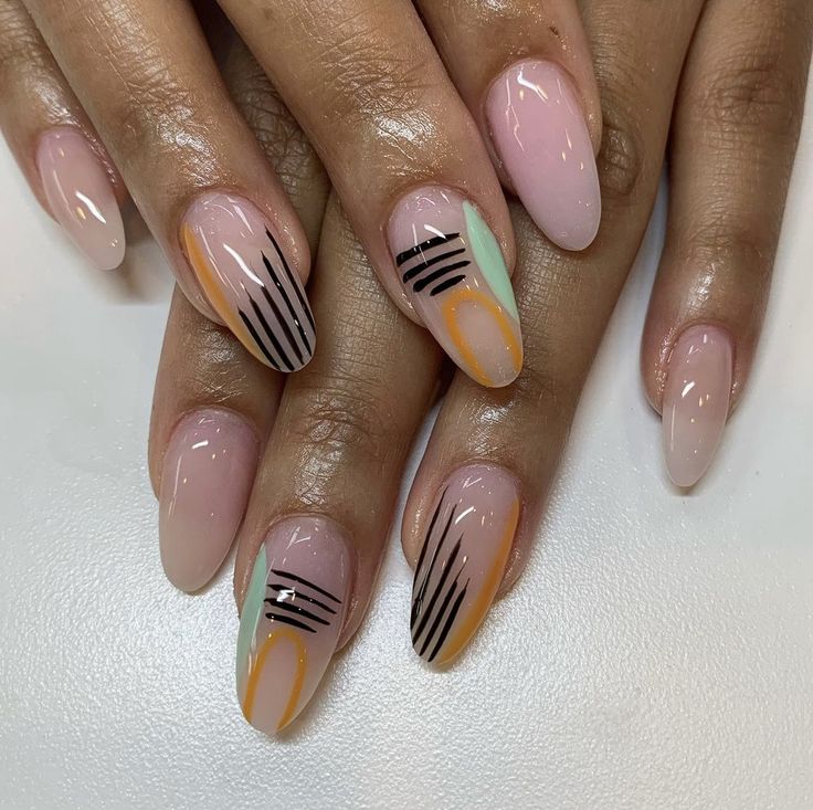 Chic and Playful Nude Nail Design with Glossy Finish and Bold Geometric Accents.