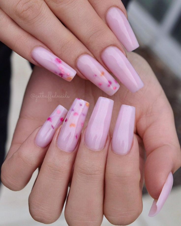 Chic Pastel Pink Almond Nails with Playful Color Accents